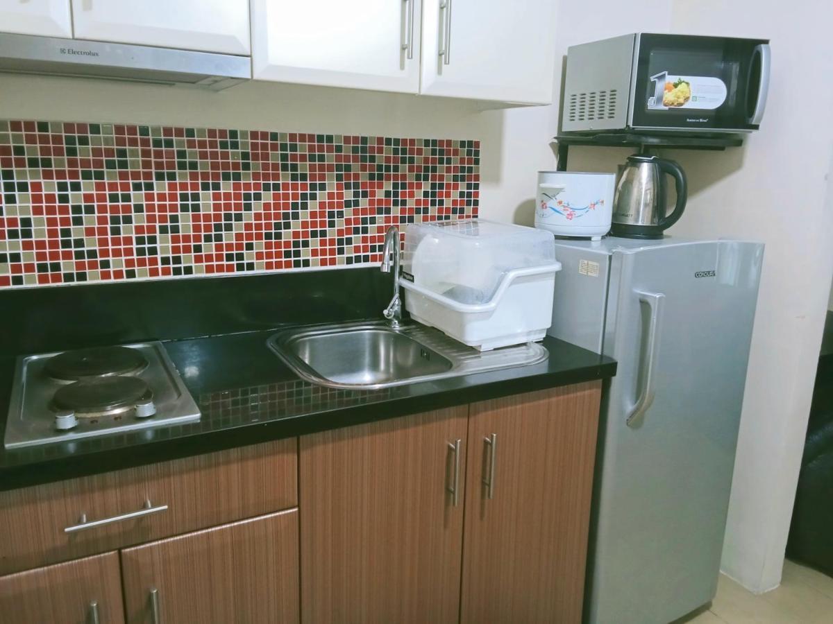 Henry'S Newport Condotel Pasay Esterno foto