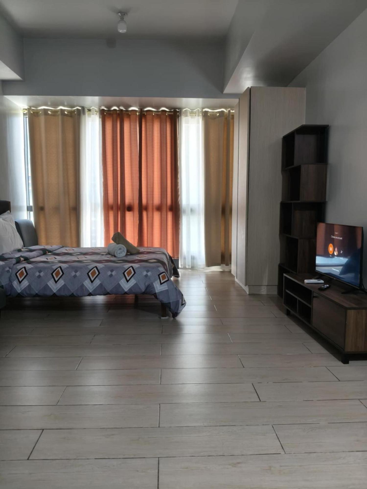 Henry'S Newport Condotel Pasay Esterno foto